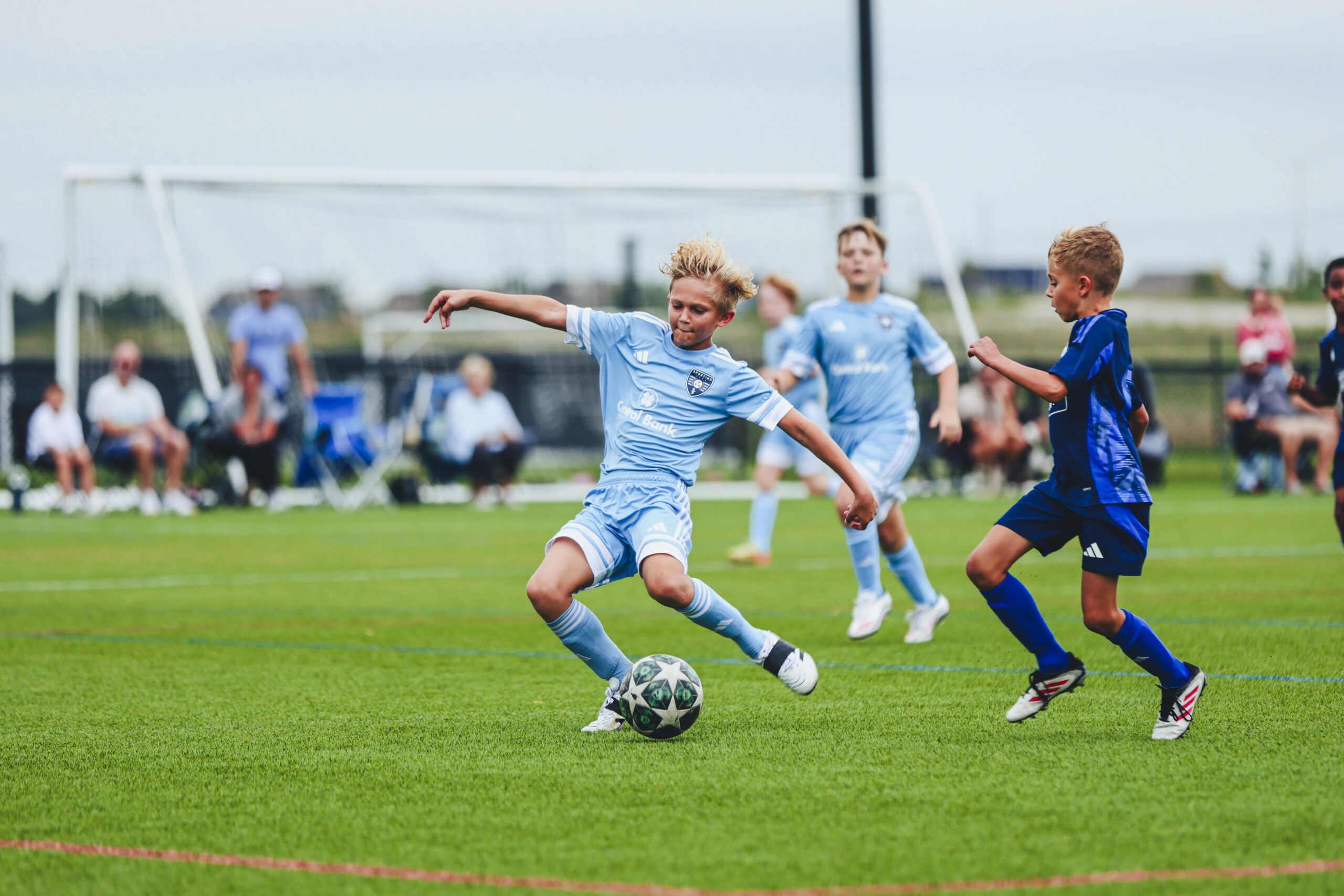 250823-SDL-15 sporting development league player kicking ball