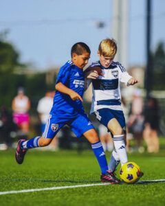 250824-SDL-7 sporting springfield and sporting nebraska players challenging for ball in sporting development league